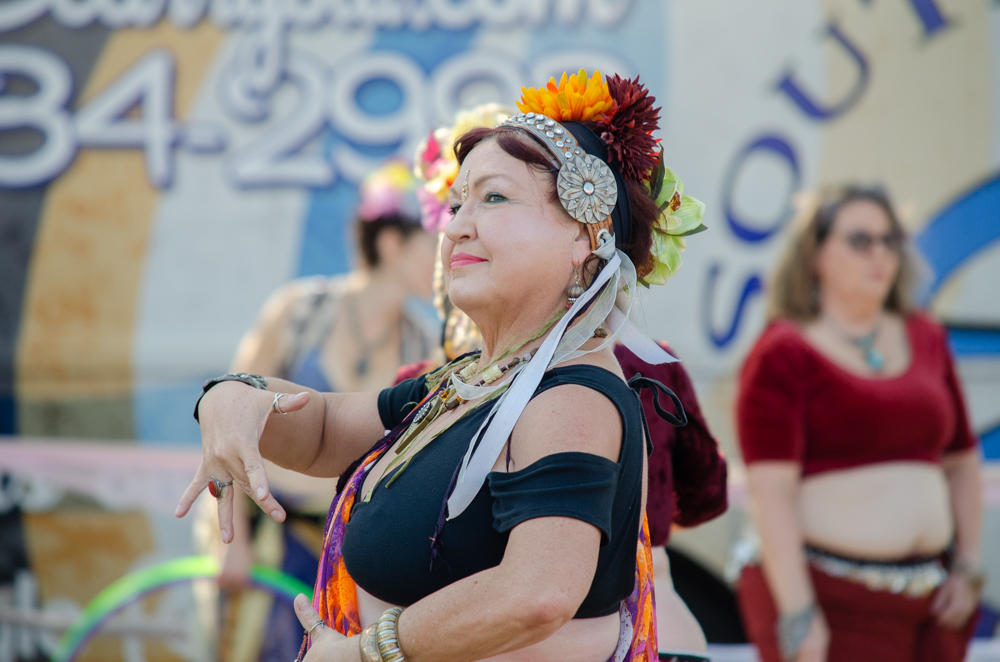 Kerry Smith dances alongside her group of belly dancers from Amira Dance Productions. On Sept. 30, a group from Amira Dance Productions joined the Great Plains Renaissance and Scottish Festival.