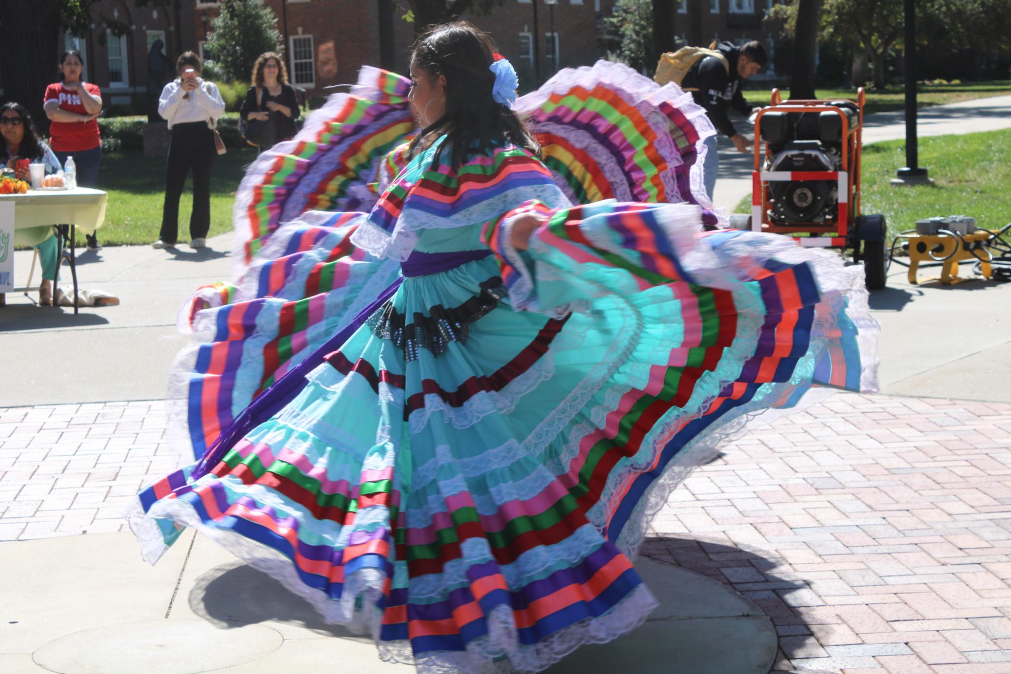 Raices De Mi Tierra Ballet Folklórico dancers performed baile folklórico or folkloric dance in Echo Circle at the Office of Diversity and Inclusions Flavors of Latin America event on Oct. 9.