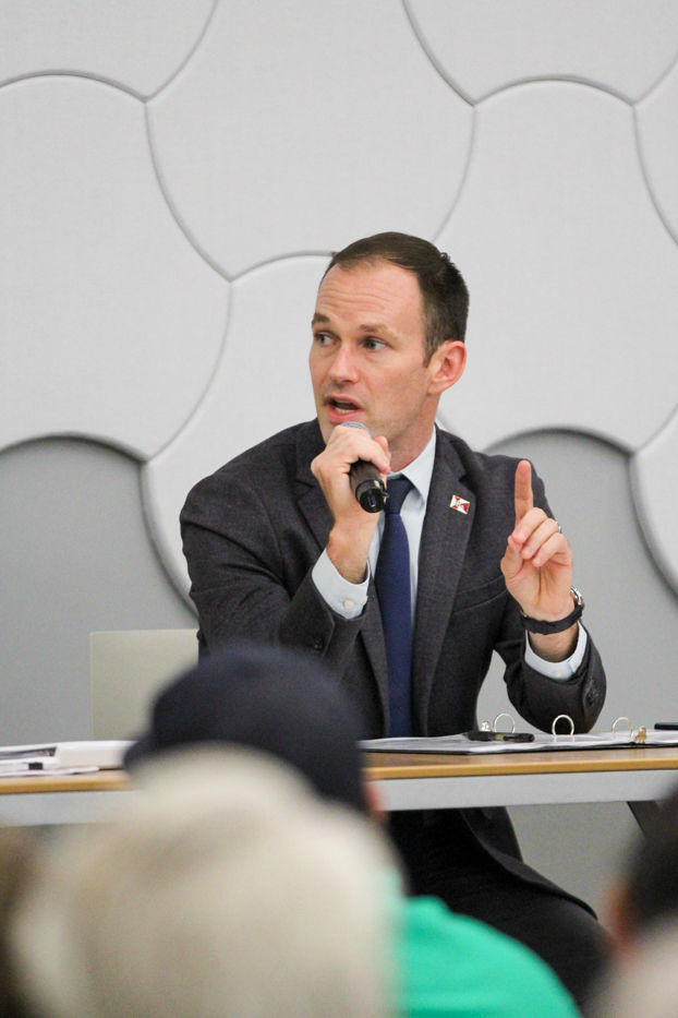 Current Mayor Brandon Whipple speaks on solutions for the unhoused community of Wichita at the mayoral candidate Forum on Oct. 11. The event was hosted in the Advanced Learning Library by Habitat for Humanity and Wichita Journalism Collaborative.