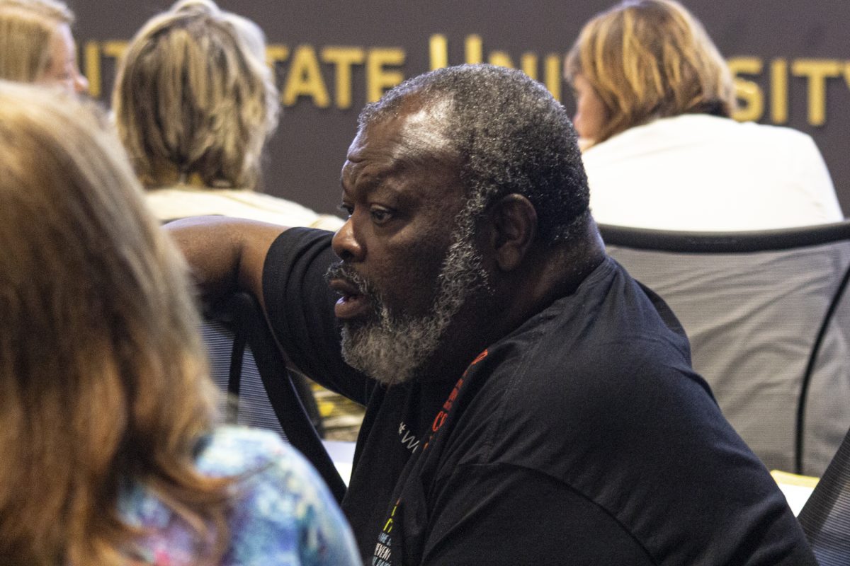 Larry Burks Sr., director of Military and Veteran Services in Student Life Listing, participates in a group discussion on how to better the Wichita State community on Oct. 11.