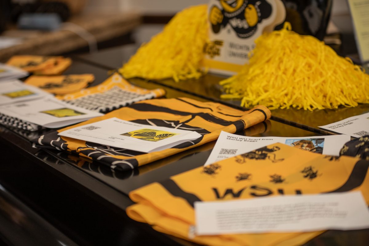 WSU scarves, many donated by former first lady of WSU Shirley Beggs, were available for auction at the Women of WSU auction and fundraiser on Oct. 3.