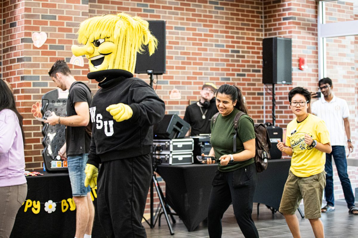 WSU students dance with WU for his 75th Birthday Bash.