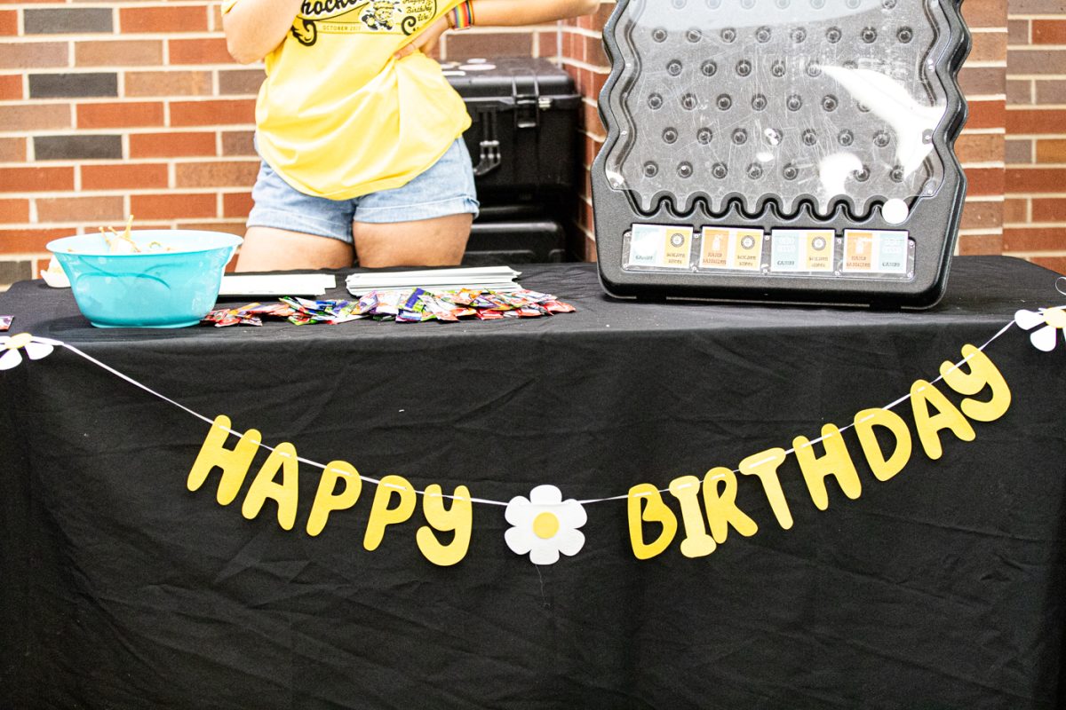 During the Birthday Bash celebration in the RSC, a table was set up with games and prizes.