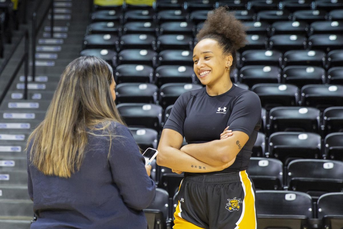 Daniela Abies speaks to a reporter on the 2023-2024 Media Day in Charles Koch Arena. Media Day gave reporters in the Wichita area a chance to speak to womens and mens basketball players.