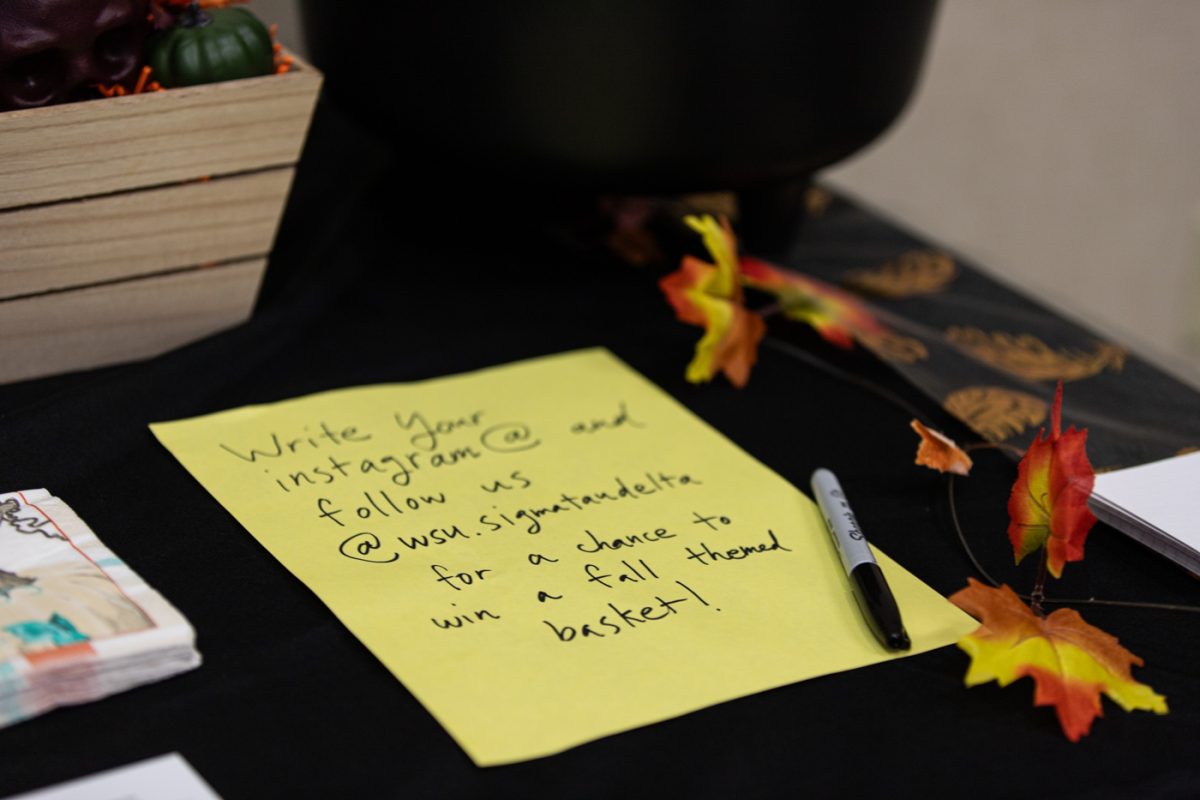 Instructions to win a spooky season basket from sigma Tau Delta.