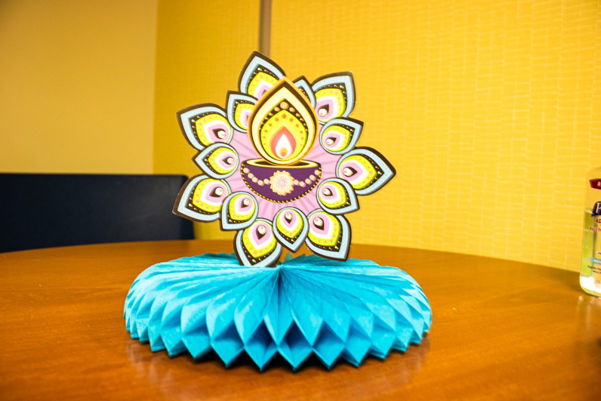 This is a mandela that is made to celebrate Diwali. This mandela decoration is an example of decorations that emphasize the vibrance of the holiday.