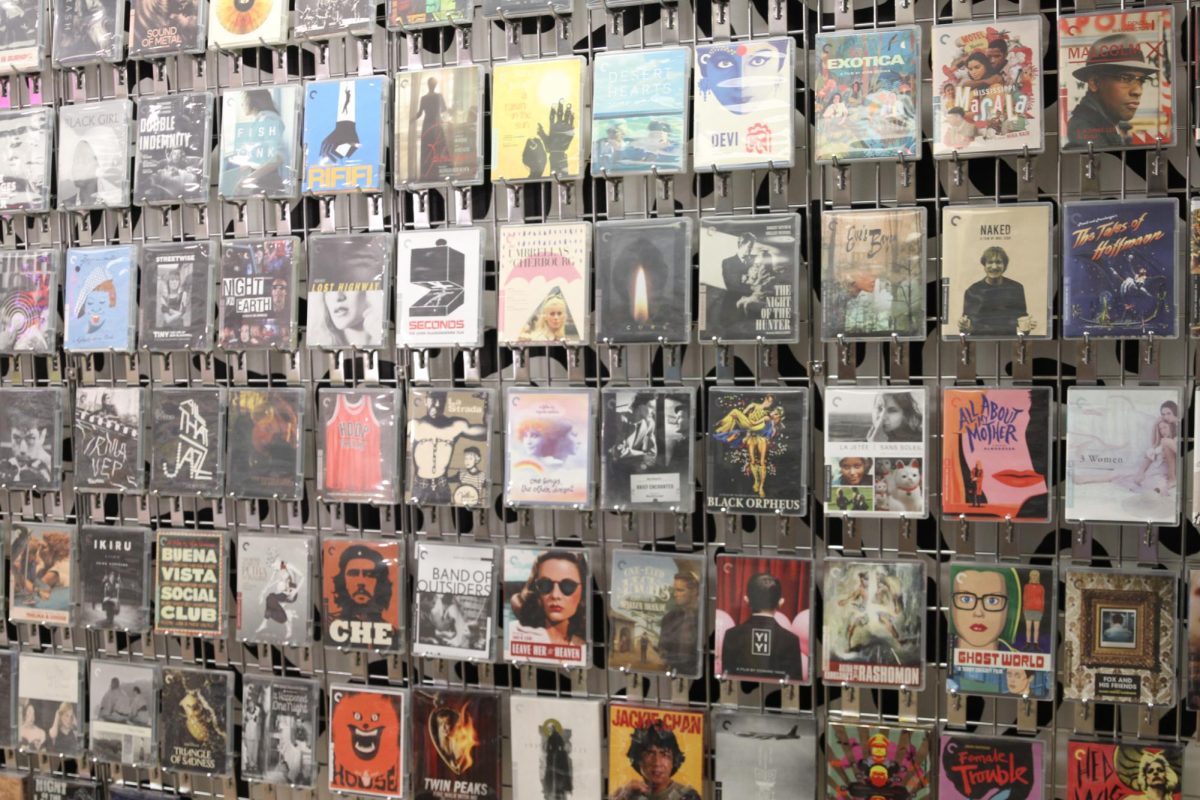 A display of Criterion Collection films available for renting, are located at CINE-GENIC CINE-GENIC, a video rental store, opened in August 2023 and is located at the back of Vortex Souvenir.