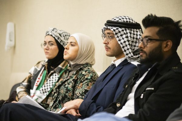 Representatives from the Arab Student Association, Jewish Student Alliance, Students Organize for Syria, and the Muslim Student Association sit at the Student Senate meeting on Nov. 1. The organizations visited SGA to share a joint statement about unity in light of the Israel-Palestine conflict.