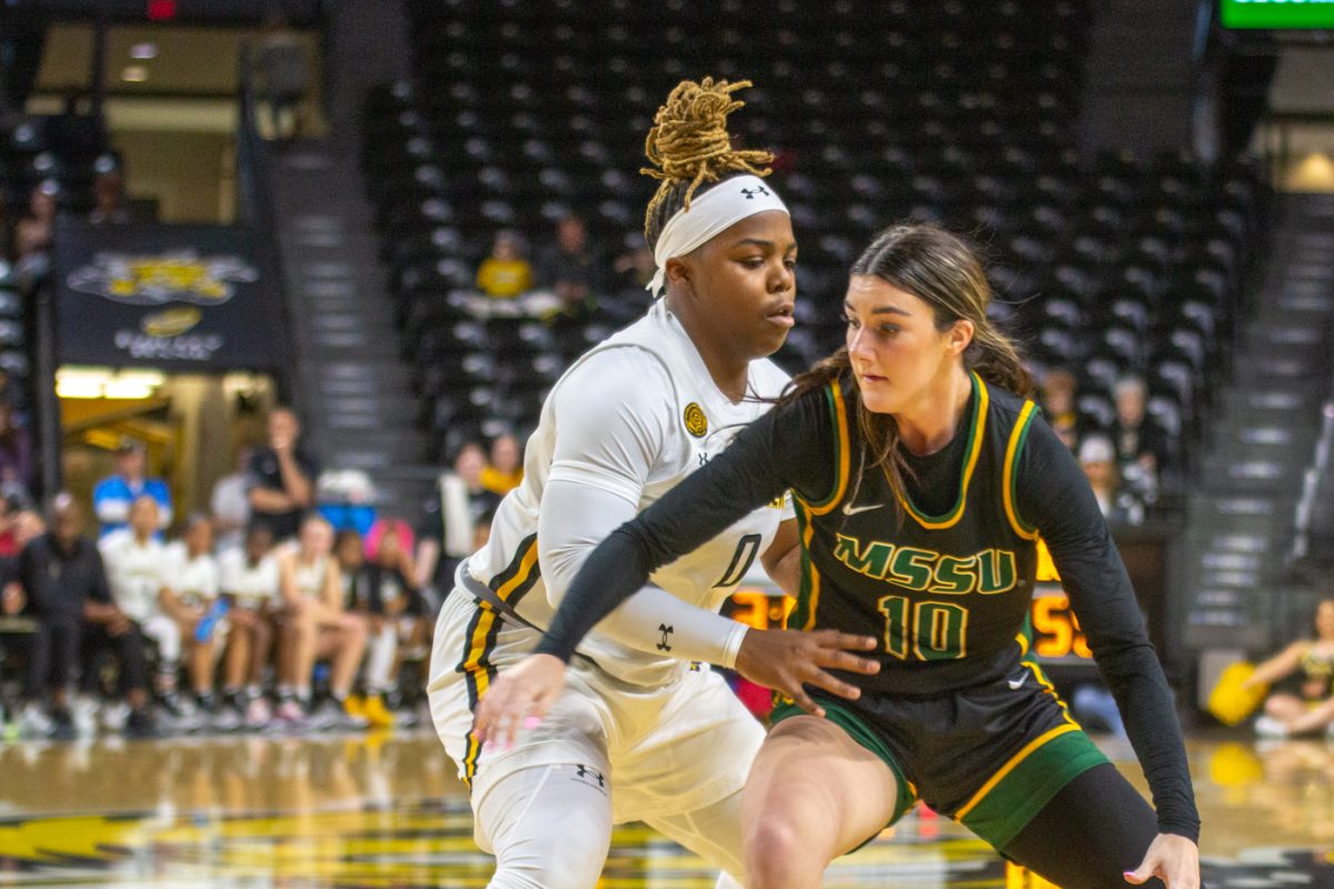Senior+Aniya+Bell+blocks+a+player+from+MSSU+at+the+exhibition+game+on+Nov.+1.+Bell+had+two+personal+fouls+by+the+end+of+the+game.