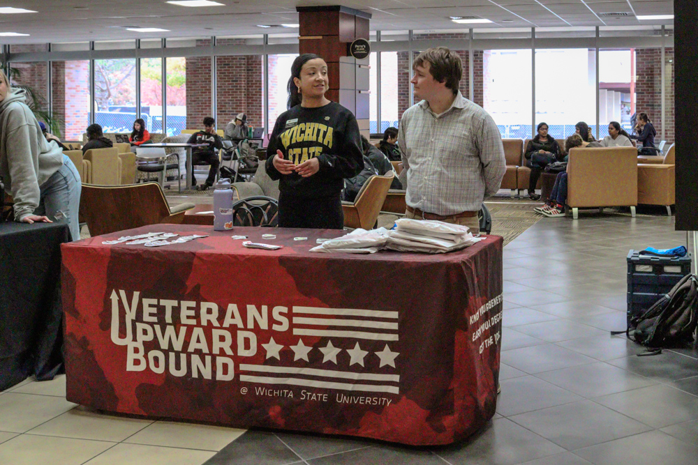 Stacia Lyday and Gage Dowling man the Veterans Upward Bound program table on Nov. 8 in the Rhatigan Student Center.