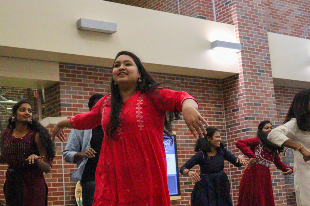 Lahari Chippada, an Indian Student Association member, dances in the flashmob event hosted to promote India Nite.