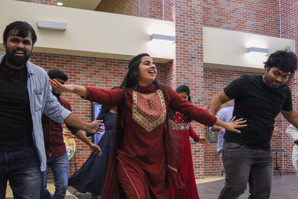 Heena Begum Mohammad, a student at Wichita State and a member of Indian Student Association, dances in the flashmob event organized by ISA on Nov. 8