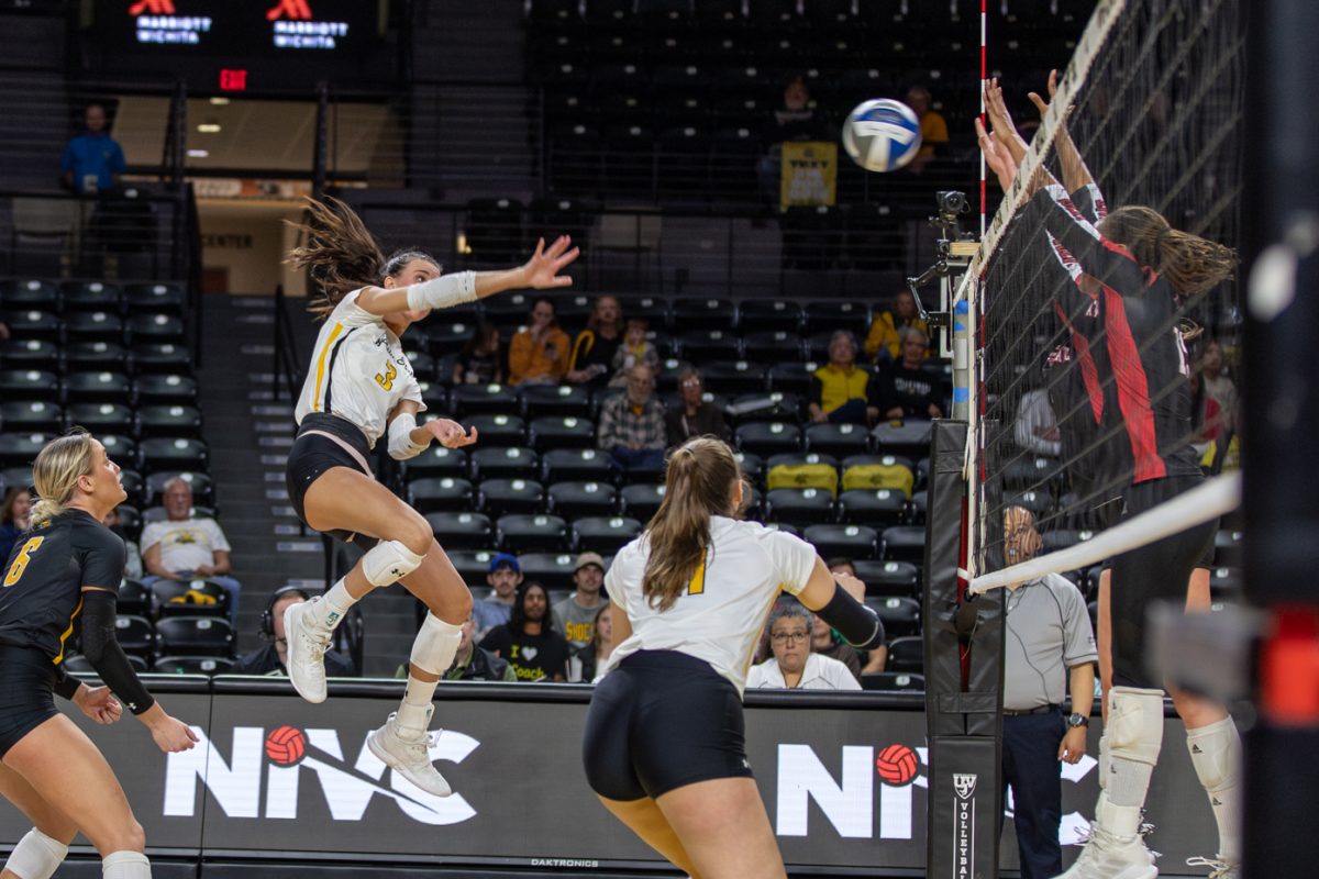 Brylee+Kelly+sets+up+for+the+kill+against+Arkansas+State+on+Nov.+30.+Following+the+win+against+Arkansas+State%2C+the+Shockers+moved+on+to+face+Tulsa+on+Dec.+1.