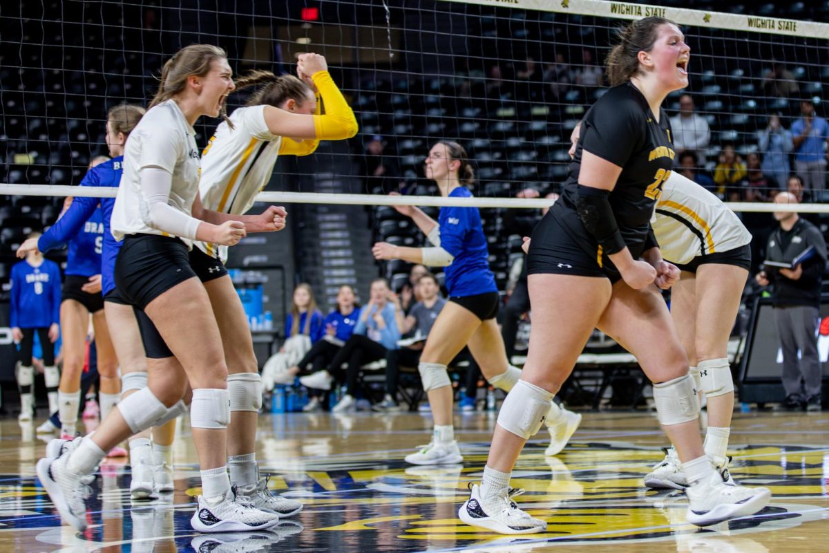 The Shockers celebrate a point made in the close first set against Drake in the Great 8 of the NIVT. Though sets usually go to 25, the Shockers won the first set 30-28.