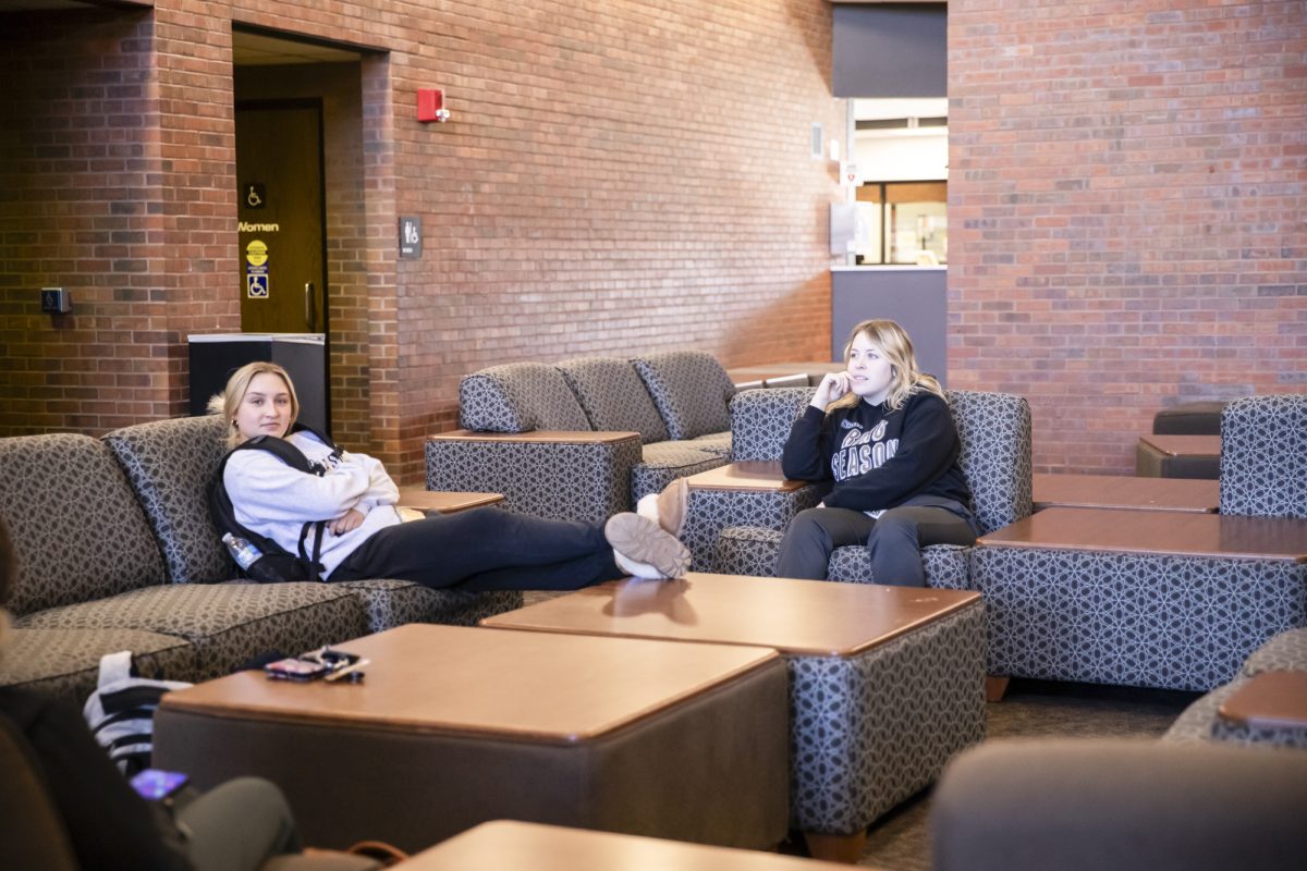 Wichita State students wait to receive a chair massage at the Heskett Center on Dec. 5.