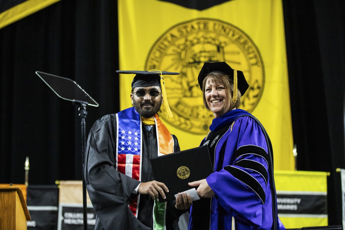 Graduate student Bharath Simha receives his diploma during the Fall 2023 Commencement ceremony on Dec. 17.