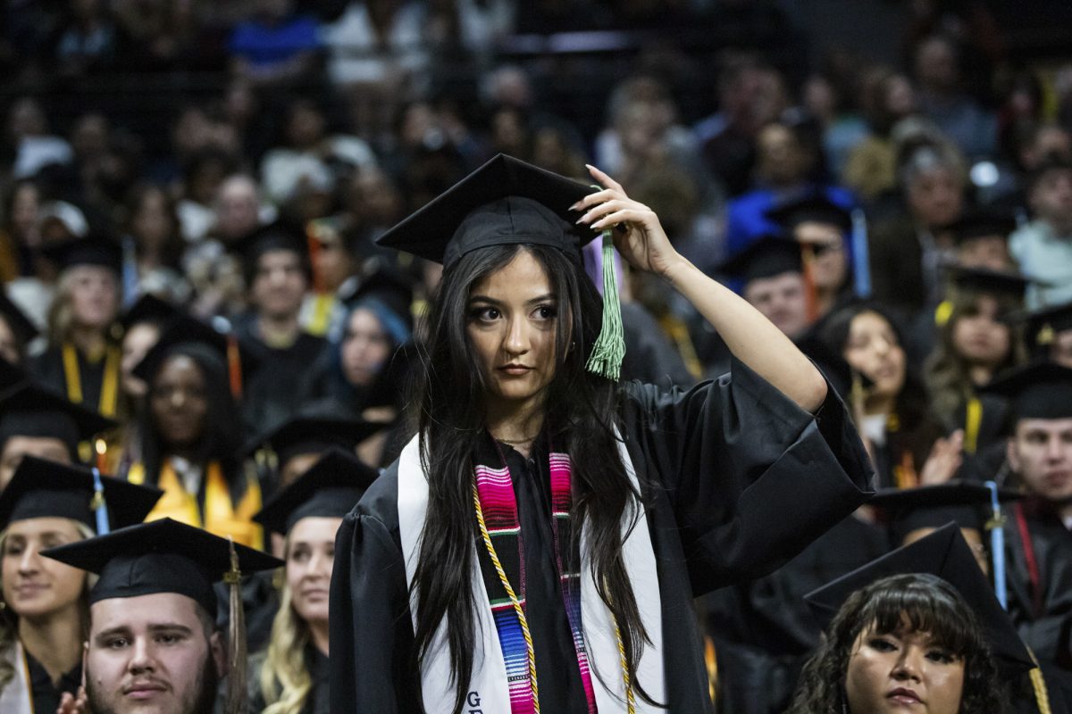 Leslie Salmon-Ordonez stands during the Fall 2023 Commencement ceremony on Dec. 17. Salmon-Ordonez graduated rite with a Bachelor of Science in Health Science.