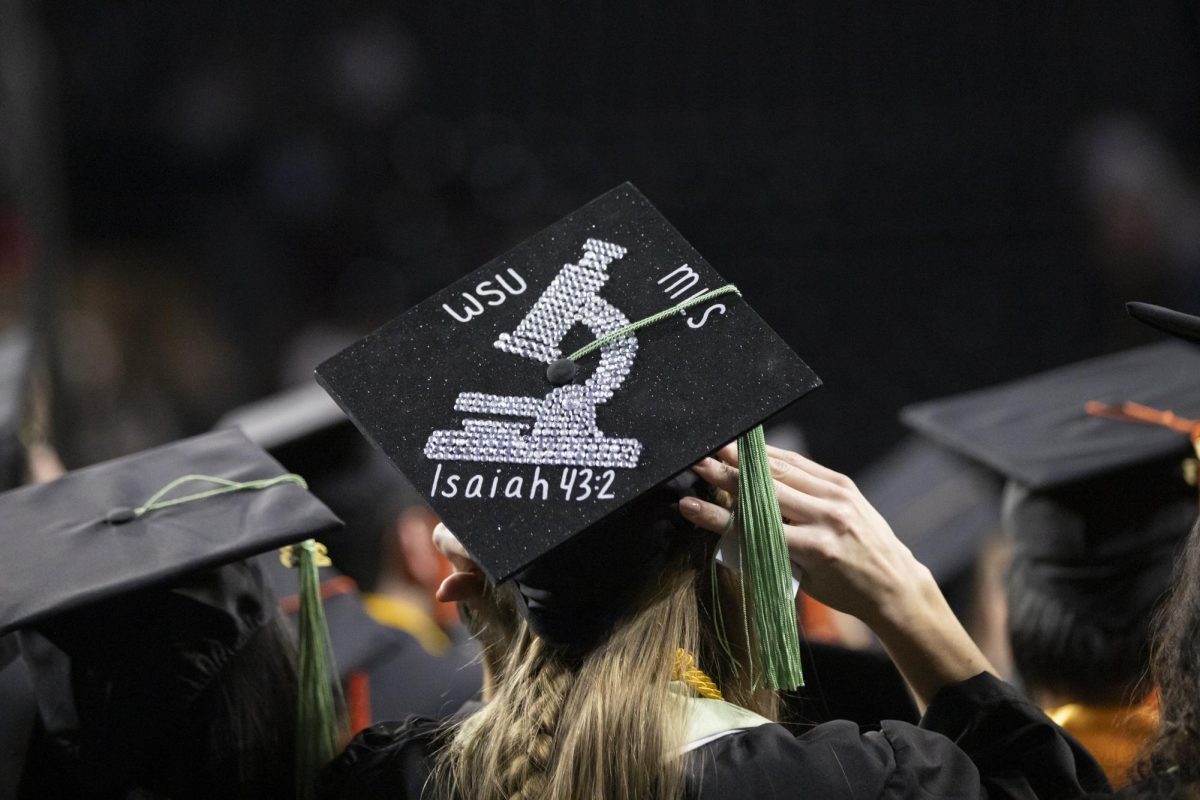 A fall 2023 graduates decorated cap.