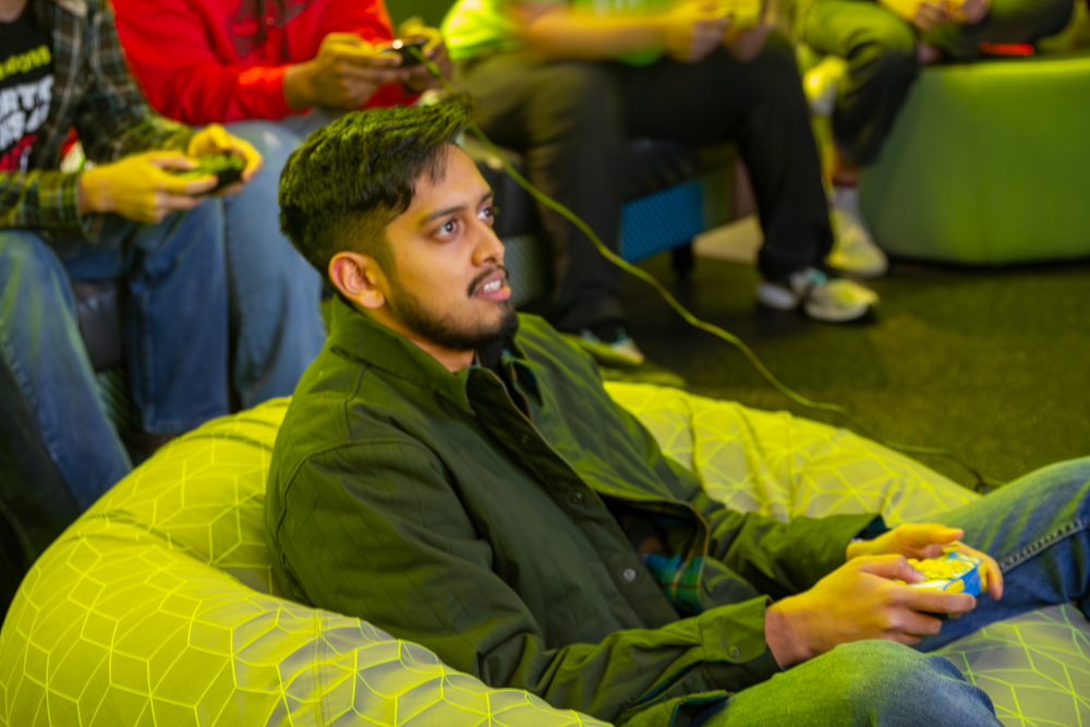 Zeeshan Khan plays Mario Kart at the 2023 Shocker Gaming Club Mario Kart tournament. He said that he saw the announcement in the WSU newsletter and came out to have some fun.
