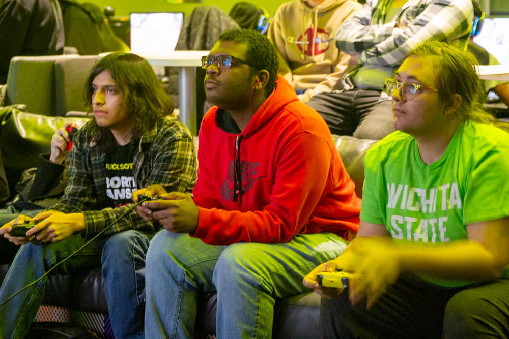 Attendees concentrate as competitors race each other in Mario Kart on Nov 29. 