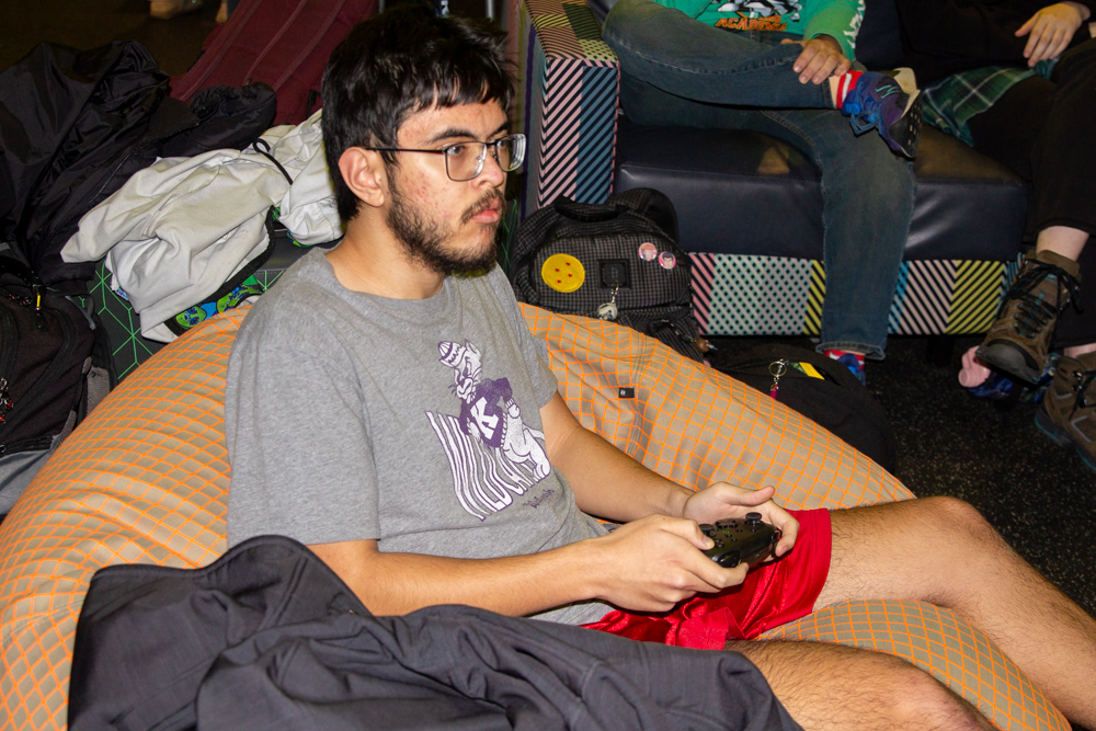 An attendee concentrates as competitors race each other in Mario Kart on Nov 29. 