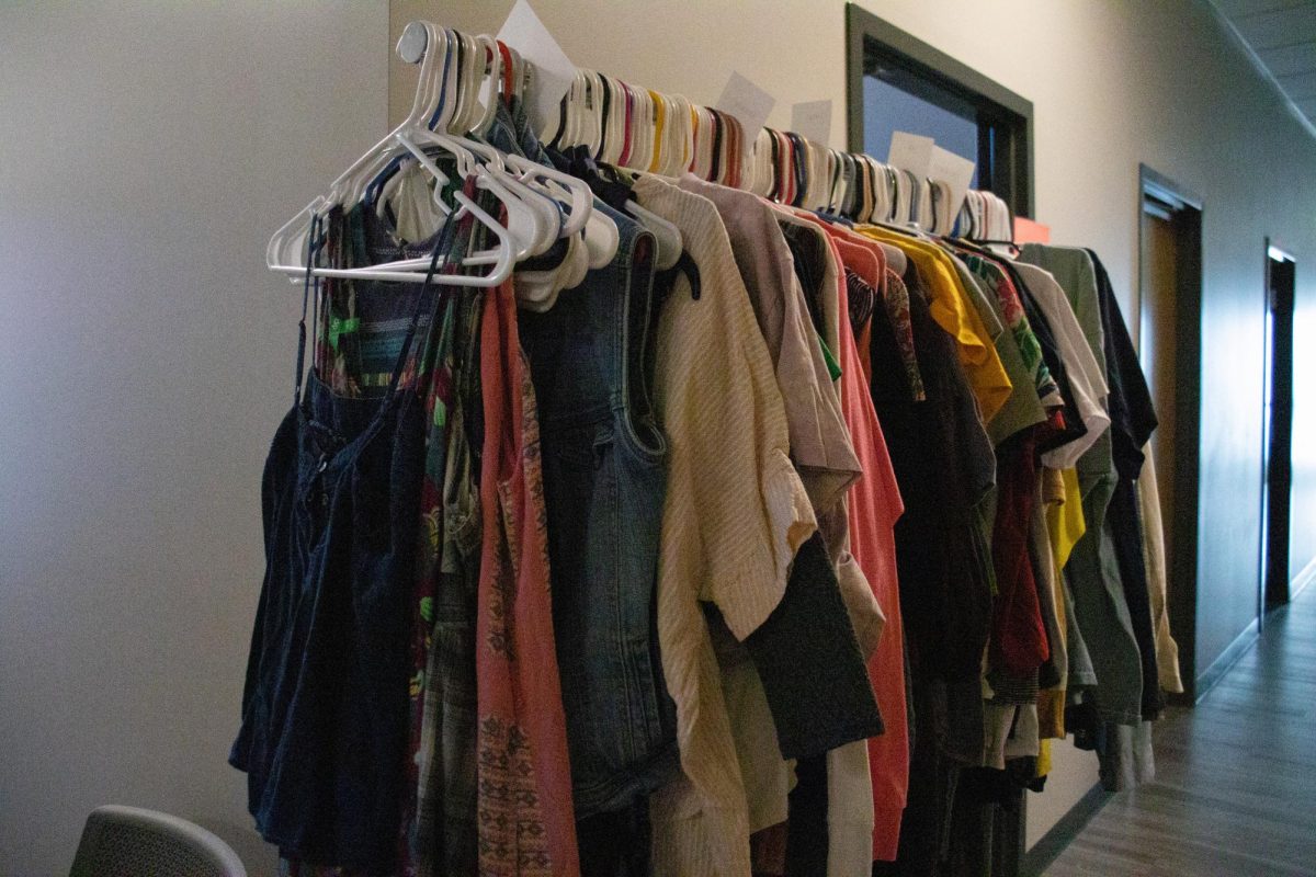 A rack with shirts hangs at the Student Health Centers Wardrobe. The Wardrobe is open and available on Mondays from noon to 3 p.m.