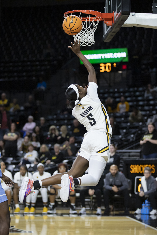 Junior forward Ornella Niankan goes up for a layup during the game against Tulane University on Dec. 30. The Shockers defeated the Green Wave, 63-60.