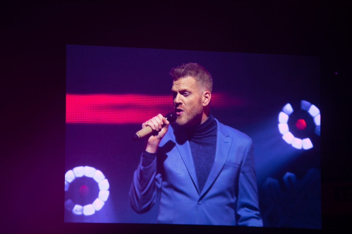 Baritone Scott Hoying of Pentatonix is shown on one of the big screens for the audience on Dec. 19 at Intrust Bank Arena. The a capella group stated their surprise that so many people in Kansas would want to see them.