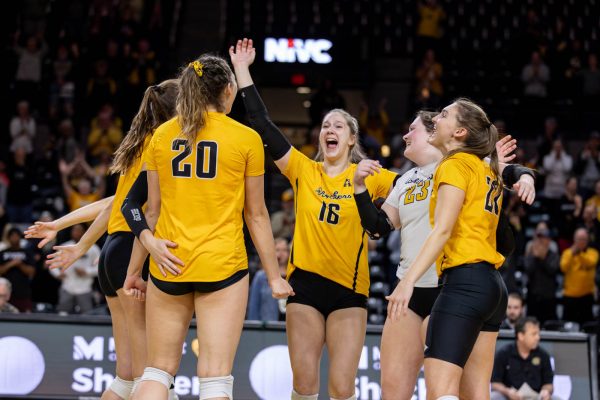 The Wichita State Shockers celebrate their win in the NIVC semi-finals match against Montana State. Following the win, the Shockers will face UTEP on Dec. 12 for the championship.