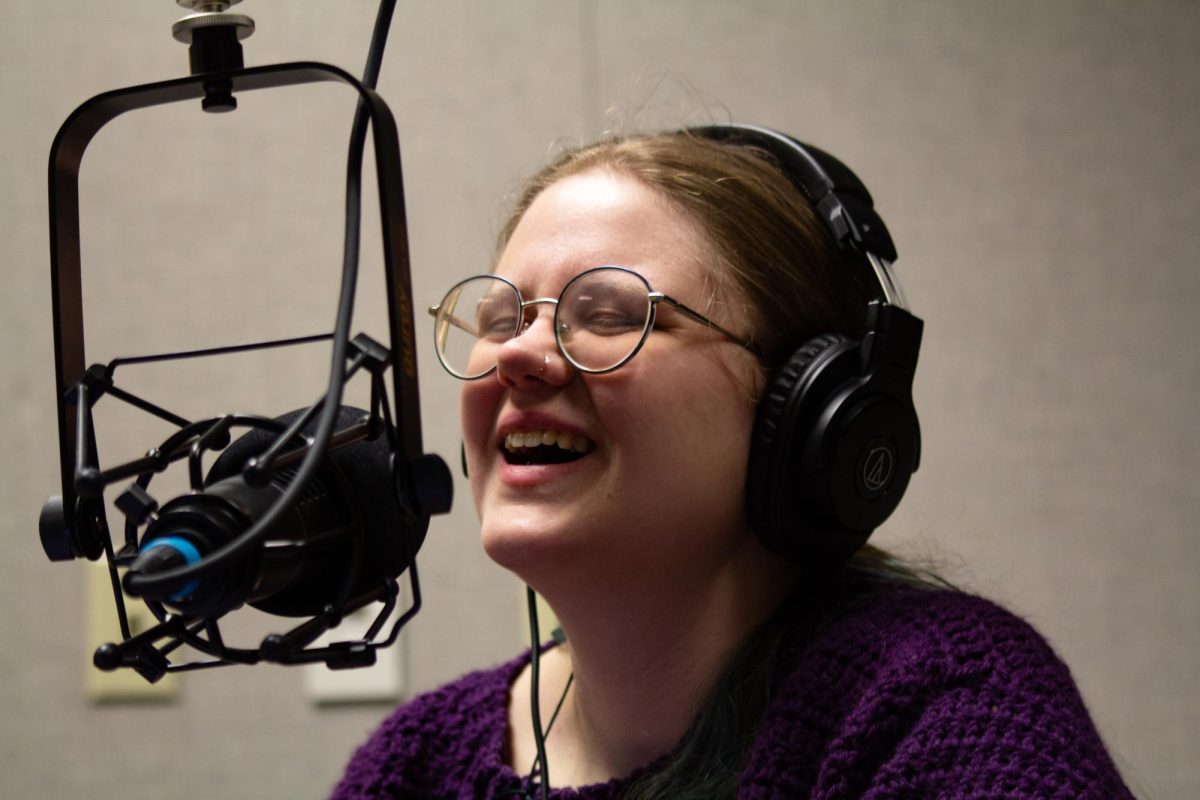 Sunflower News Podcast host Jacinda Hall laughs during an interview on Jan. 23.