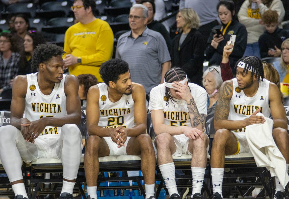 Quincy Ballard, Harlond Beverly, Bijan Cortes and Colby Rogers on the bench before the game against Southern Methodist University on Jan. 28.