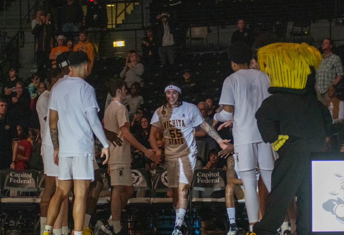 Fans in Charles Koch Arena cheer as Bijan Cortes, a junoir guard for Wichita State University is announced. He scored  seven points for WSU on Jan. 28.