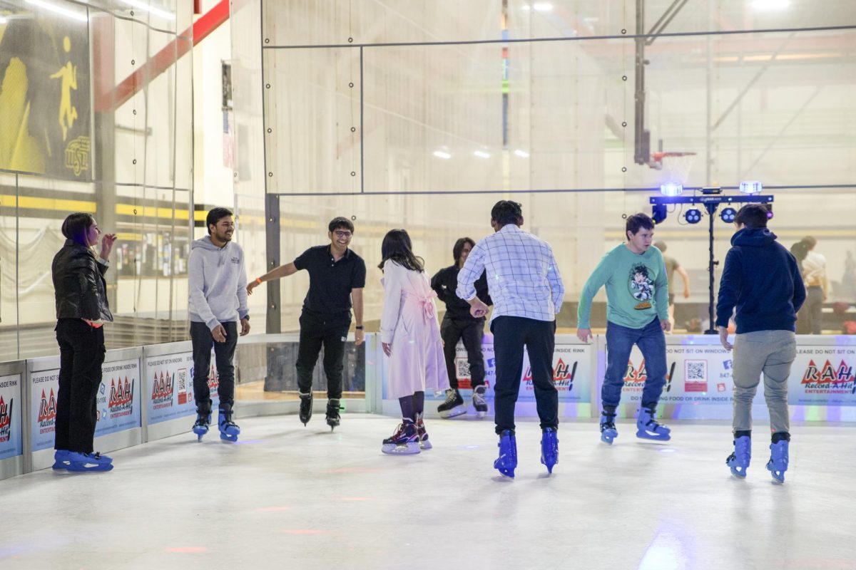 Skaters hit the ice at the rink set up in the Heskett Center. Students, faculty and staff participated in Winter Welcome on Friday, Jan. 19.