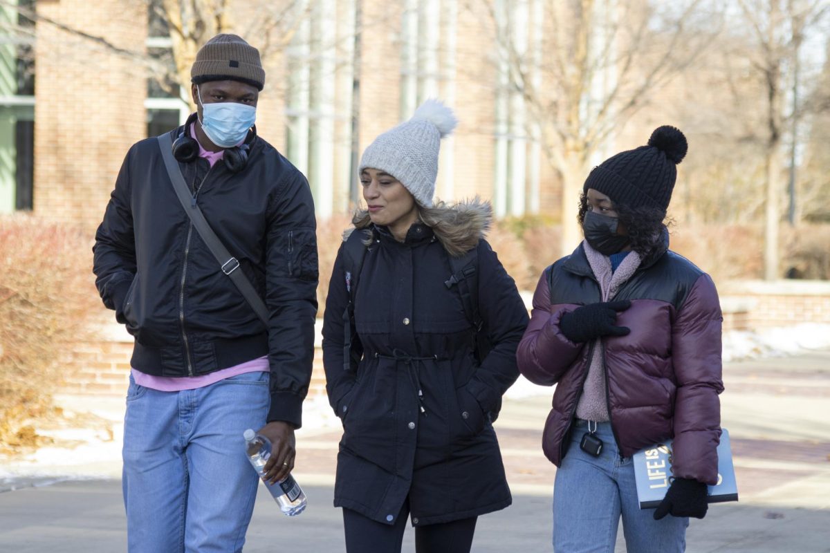 Students at Wichita State walk through campus bundled up on the first in-person day back to school. Wednesday, Jan. 17 was a cool 30 degrees Fahrenheit most of the afternoon.