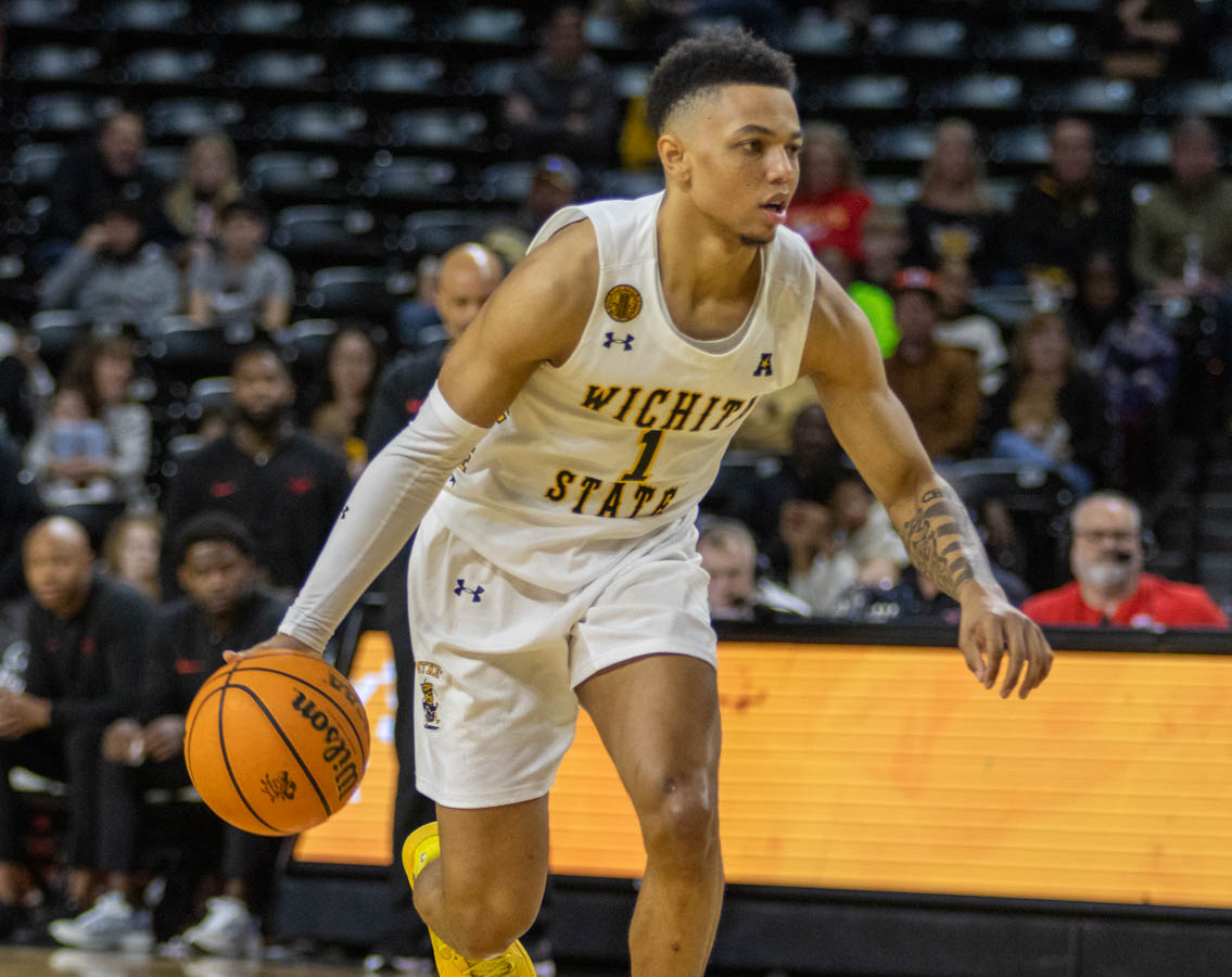 Junior guard Xavier Bell looks to drive the ball during the game against Southern Methodist University. Bell scored nine points for the Shockers during the game on Jan. 28.