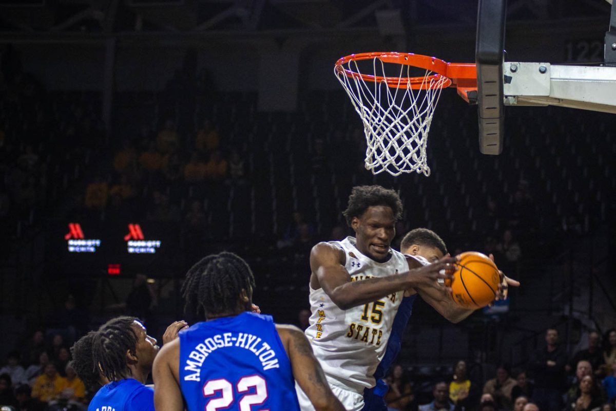 Quincy Ballard, a junior center, grabs two points for Wichita State during the game against Southern Methodist University on Jan. 28.