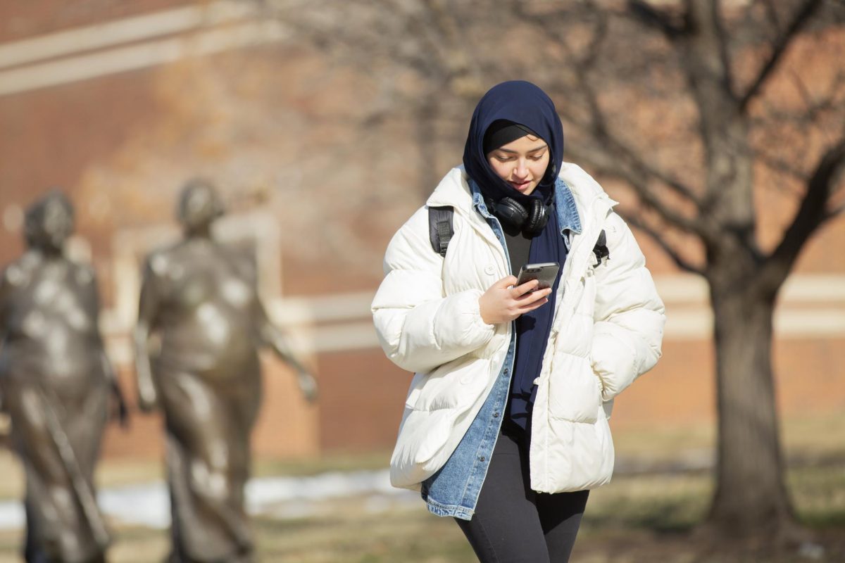 A student at Wichita State walks through campus on the first in-person day back to school. Wednesday, Jan. 17 was a cool 30 degrees Fahrenheit most of the afternoon.