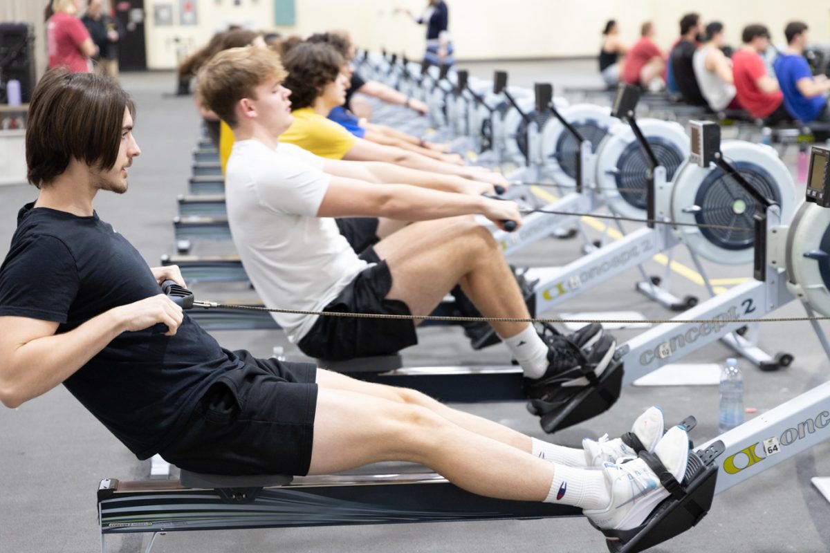 Filmmaking major Jayden Rivas uses an ergometer machine at rowing team practice in the Heskett Center gymnasium. The Wichita State rowing team practices on ergometer machines on Tuesdays and Thursdays and does strength and conditioning for the rest of the week in preparation for their spring season.