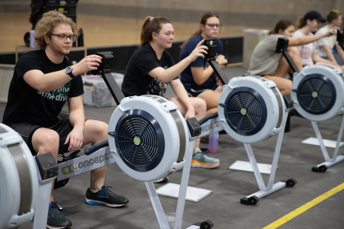 The Wichita State rowing team practices on ergometer machines in the Heskett Center gymnasium. The rowing team uses ergometer machines on Tuesdays and Thursdays in preperation for their spring season.