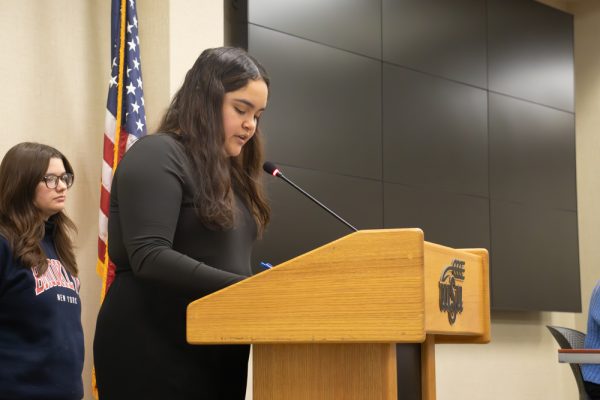 Chief Elections Commissioner Gigi Guzman announces the unofficial results of the special election during the Student Government Assocation session on Wednesday, Jan. 24. The Constitutional amendment was unofficially passed with 246 votes in affirmation.