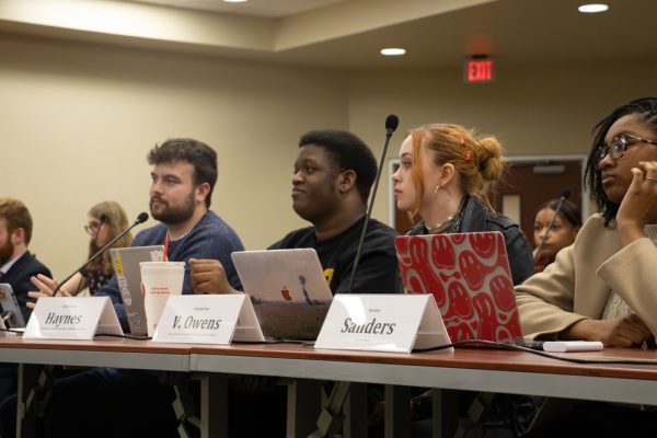 Student Government Assocation (SGA) Senators Jay Thompson, Aaron Haynes, Victoria Owens and NaKhiya Sanders listen to the unofficial special election results during Wednesdays SGA senate meeting. Nearly 74% of voters voted in affirmation of the constitutional amendment.
