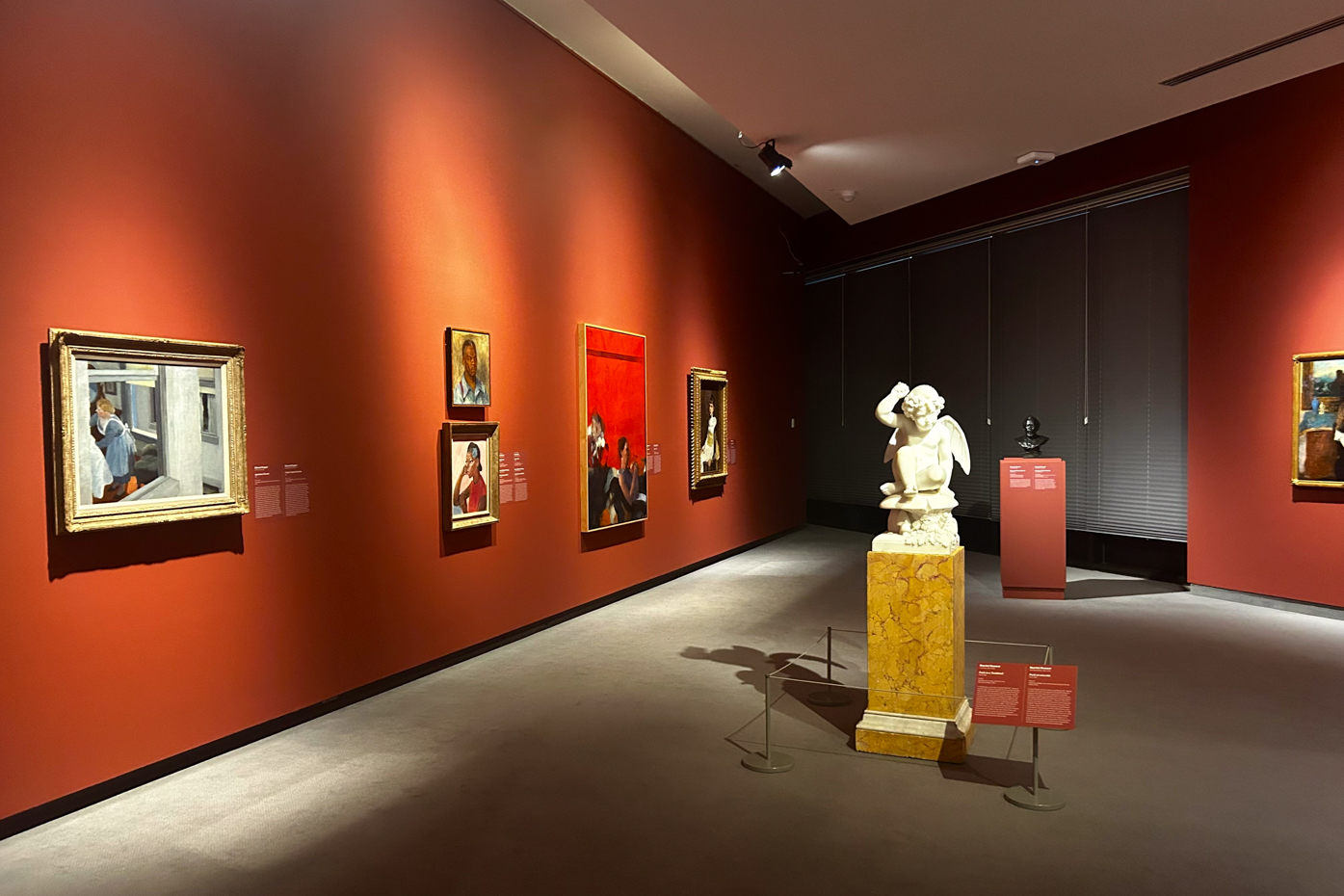 A view of the gallery featuring “Puck on a toadstool” by Harriet Hosmer. She was born in 1830 and was sometimes known to flow between femininity and masculinity. In William Shakespeare’s “A Midsummer Night’s Dream,” Puck is not assigned a gender in the play and can be played by any person.