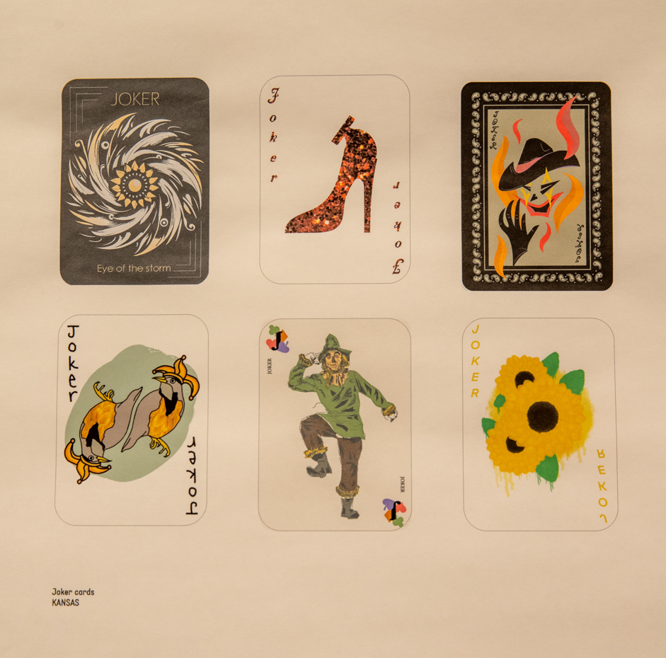 The new Wichita/Sarajevo Connecting Stories exhibition displays decks of cards created by students from Wichita State University and The Academy of Fine Arts in Sarajevo. The image shows a deck of joker cards from a student in Kansas. 