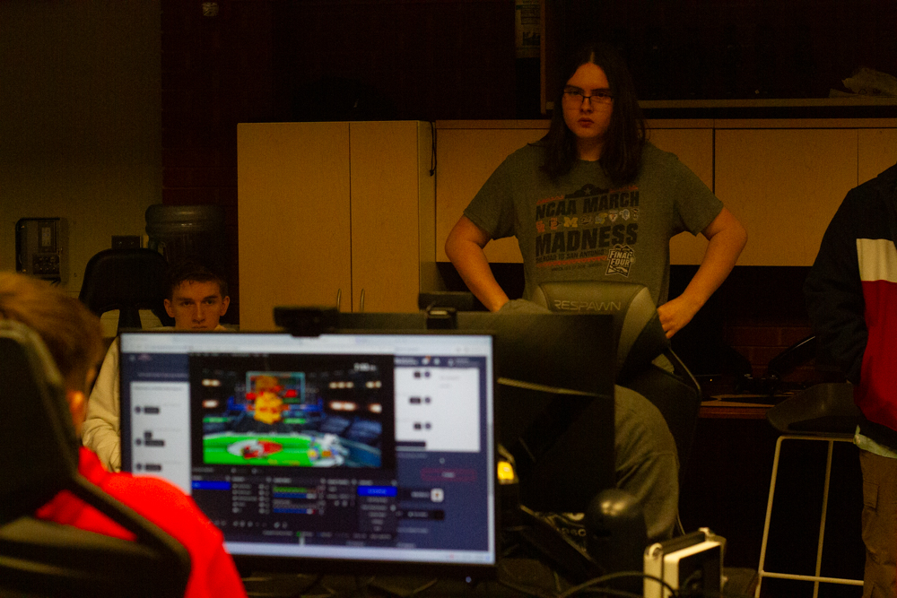 Sean Fontes watches a member of WSU's varsity esports team compete against Fisher college in Super Smash Brothers.