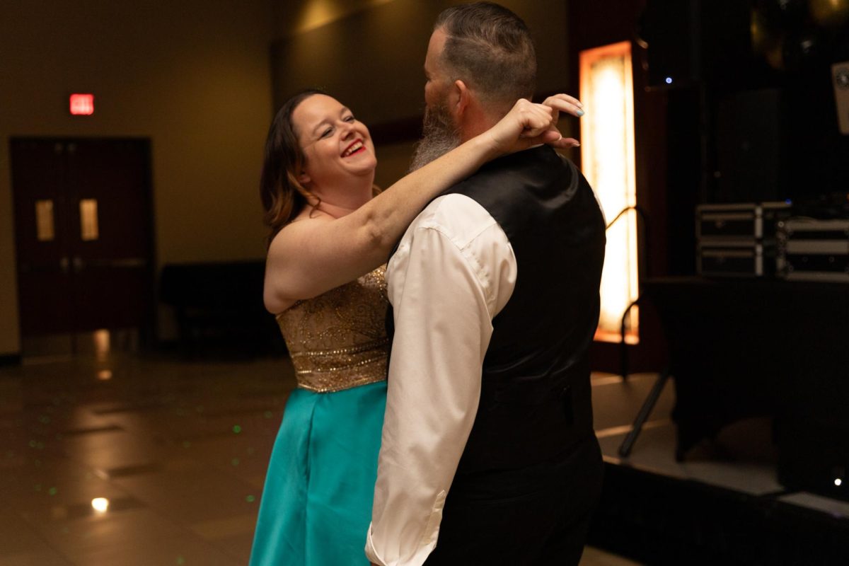 A couple dances together at the Fairmount Formal on Feb. 2. The annual Fairmount Formal, hosted by the Student Activities Council, was held in Beggs Ballroom and had music, a dance floor, refreshments, and a photo booth for students to enjoy.