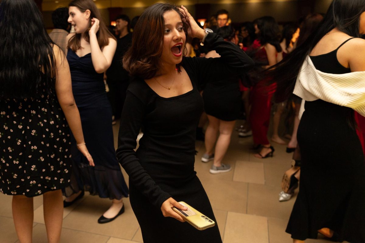 A student socializes at the Fairmount Formal on Feb. 2. The annual Fairmount Formal, hosted by the Student Activities Council, was held in Beggs Ballroom and had music, a dance floor, refreshments, and a photo booth for students to enjoy.