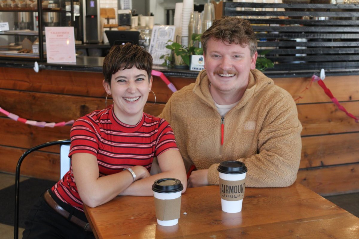 Ellen Mosiman and Dustin Youngman pose for a photo at Fairmount Coffee Co. Mosiman and Youngman were graphic design majors at Wichita State and have continued working in the industry. The two got married in July of 2023. 