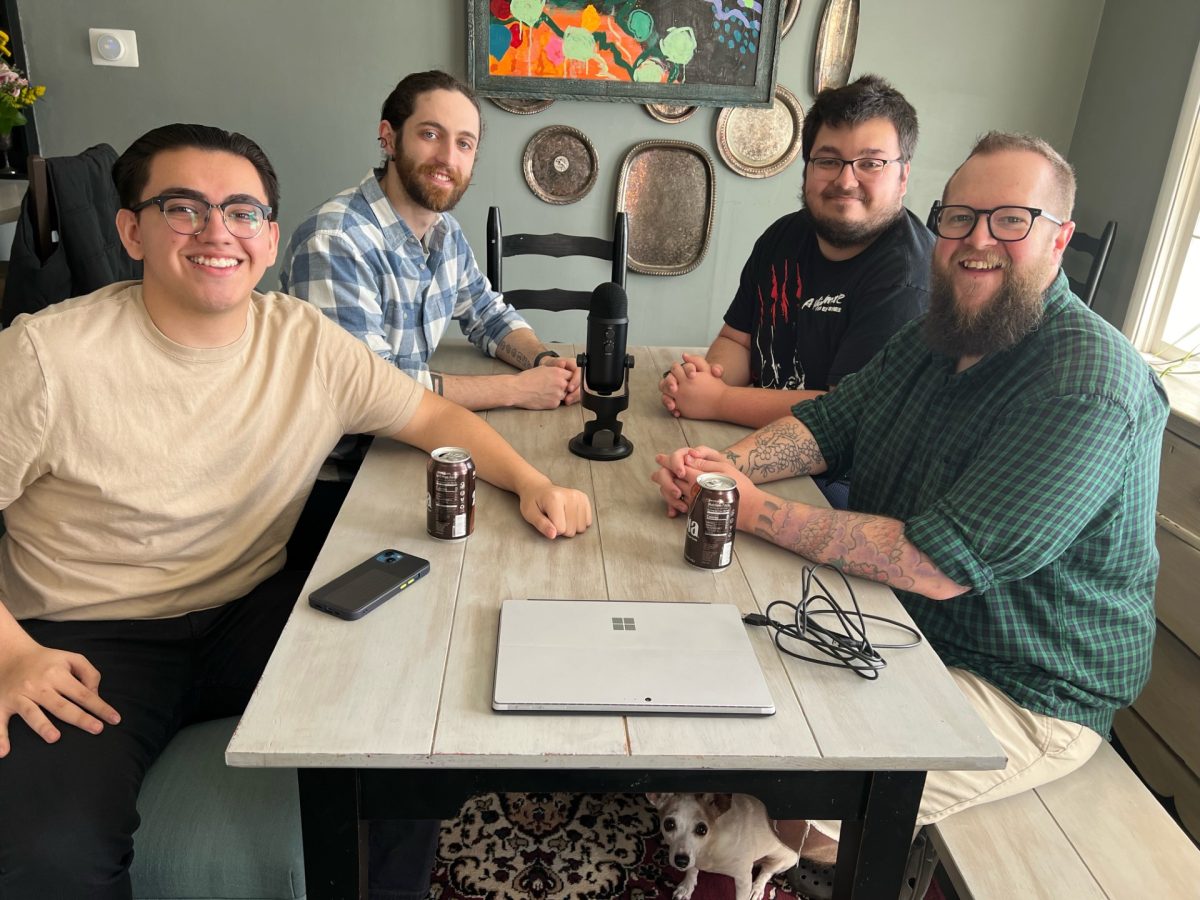 Damian Montañéz, Alec Dulaney, Timber Keller and Greg Chewning pose for a photo during a recording session for their mental health podcast on Sunday, Feb. 25. The four are all clinical mental health counseling students at Wichita State. Photo courtesy of the group.