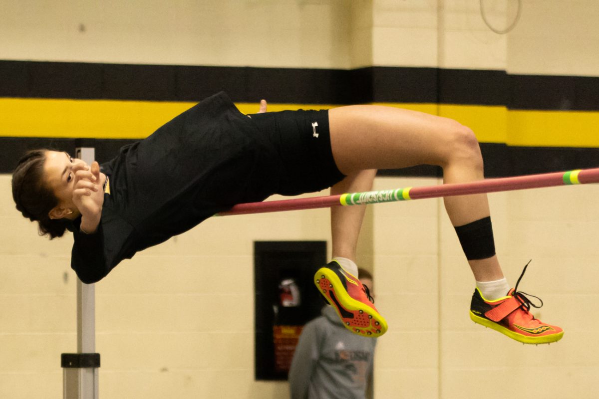 Destiny Masters, one of Wichita States track and field athletes, does a practice jump at Wilson Invitational on Jan. 25.