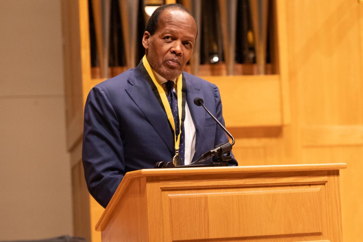 Lee Pelton gives a speech at the Fairmount College of Liberal Arts and Sciences Hall of Fame induction on Feb. 6 in Wiedemann Hall.